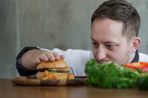 istock Chef checking up meat burger before serve, work lifestyle concept. 948465218