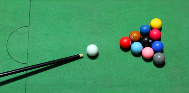 istock Billiards balls on the green table 948468626
