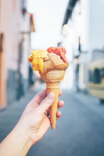istock Female's hand holding Gelato. 948480998