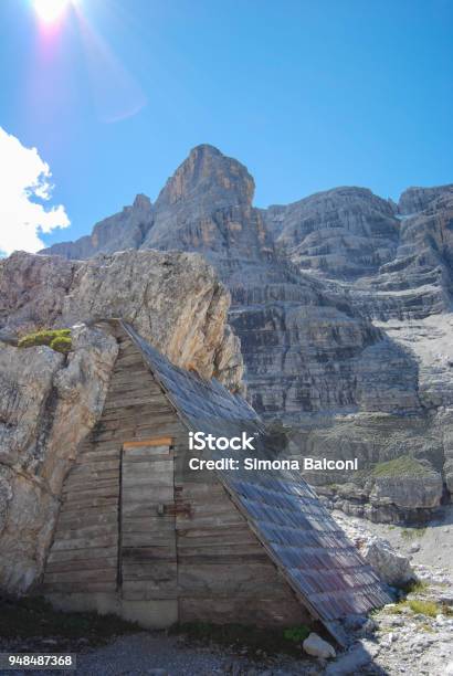 Small Hut Camouflaged Among The Dolomitis Rocks Trentino Alto Adige Stock Photo - Download Image Now