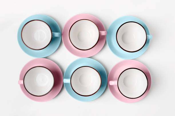 istock Blue and pink cups on abstract background 948491348