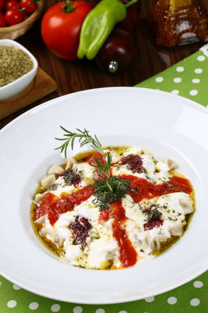 istock Turkish Manti with Yoghurt and Gravy Sauce - Ravioli 948492058