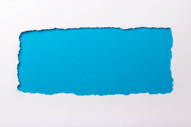istock Ripped white paper with colored background with space for text 948495328