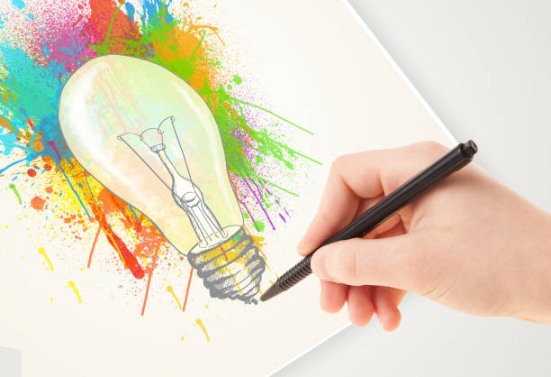 istock Hand drawing colorful idea light bulb with a pen 948495522