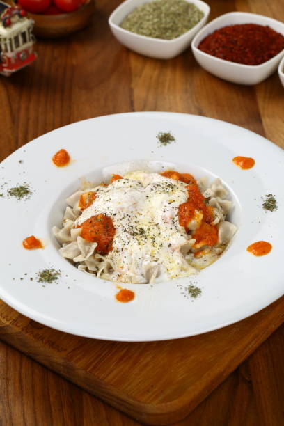 istock Turkish Manti with Yoghurt and Gravy Sauce - Ravioli 948498188