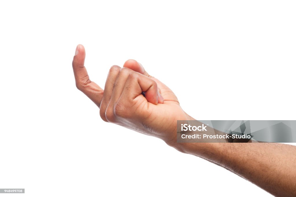 Black male hand beckoning isolated on white Black male hand beckoning isolated on white background. African american man gesturing with one finger, come here symbol Hand Stock Photo
