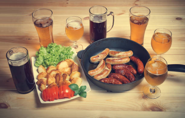 istock Beer, grilled sausages and roasted potato 948499806