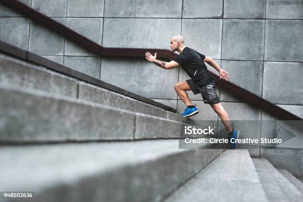 Determination Stock Photo - Download Image Now - Running, Steps, City