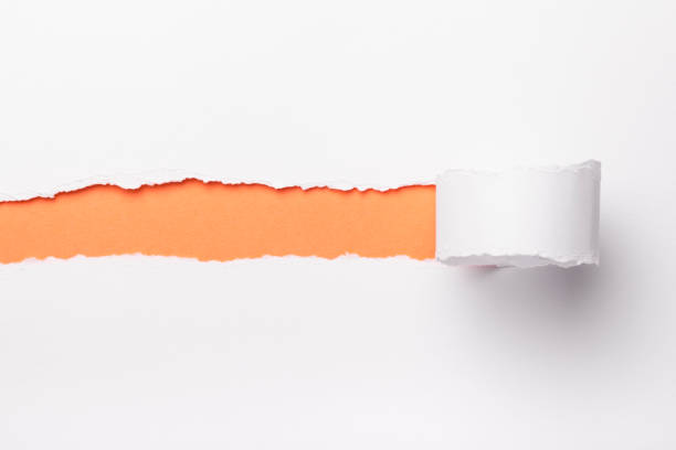 istock Ripped white paper with colored background with space for text 948502888