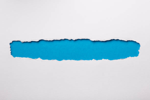 istock Ripped white paper with colored background with space for text 948507924