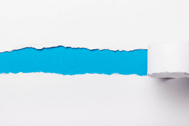 istock Ripped white paper with colored background with space for text 948508208