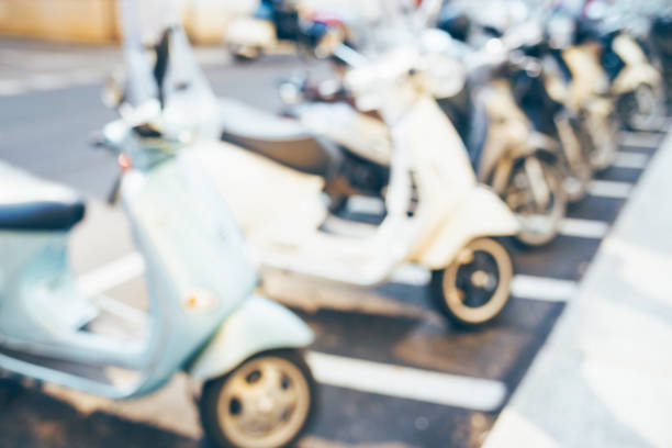 Blurred italian street with scooters. Traditional italian transport.