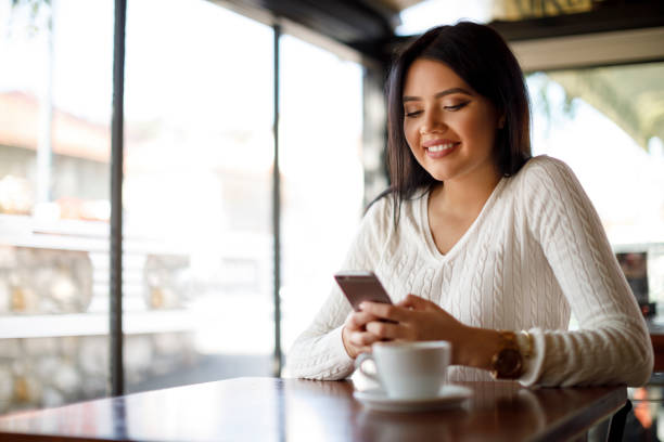 istock Young woman enjoying coffee break 948511698