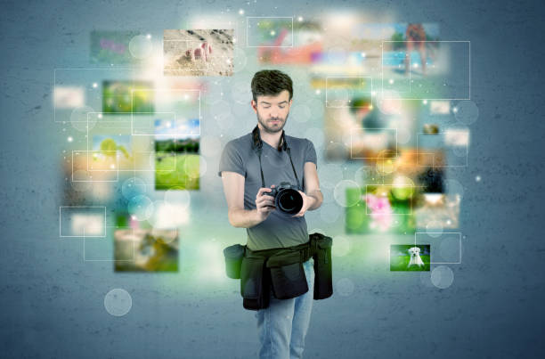 istock Photographer with pictures from the past 948512872