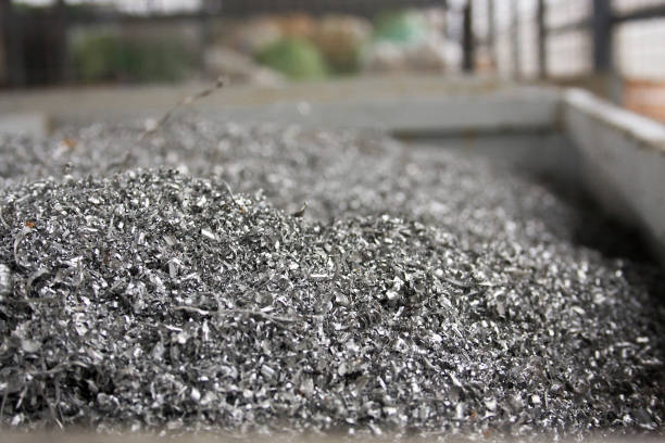 Scrap aluminum dust and metal trash stock photo