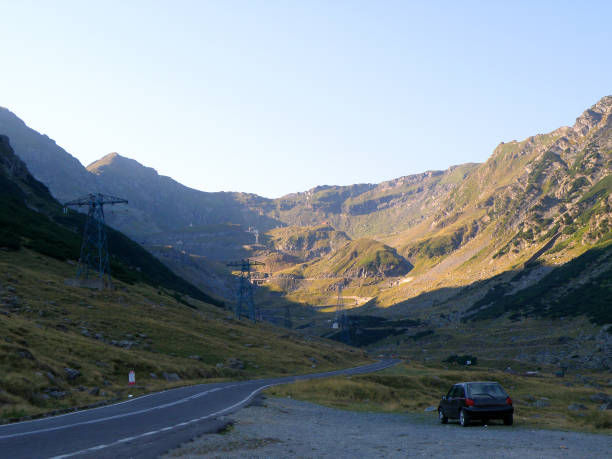 istock Car parked on Transfagarasan, Romania 948519048