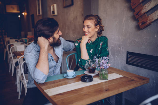 istock Couple in coffee shop 948519090