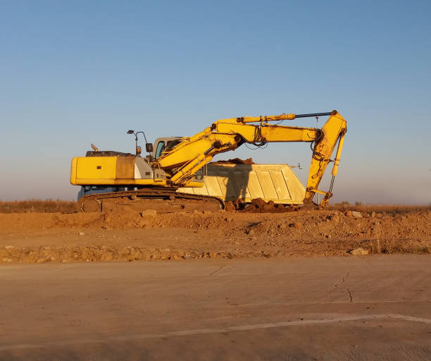 istock Truck and excavator 948519626