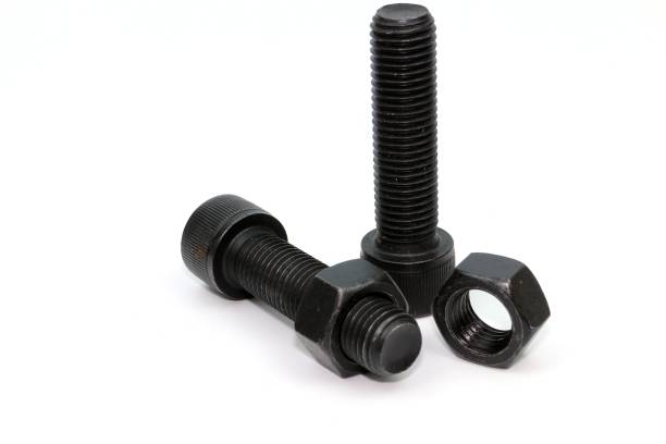 istock Black steel bolts and nuts mechanical part 948520296