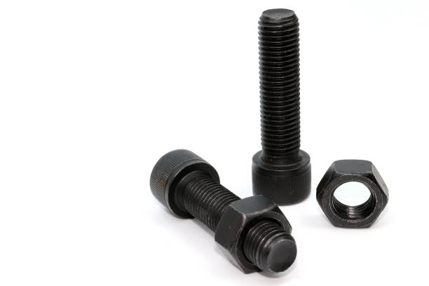 istock Black steel bolts and nuts mechanical part 948520306