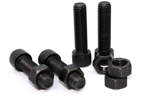 istock Black steel bolts and nuts mechanical part 948520362