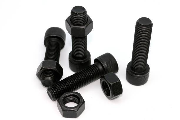 istock Black steel bolts and nuts mechanical part 948520410