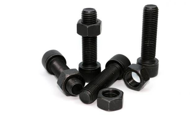 istock Black steel bolts and nuts mechanical part 948520450