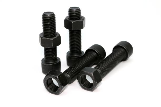istock Black steel bolts and nuts mechanical part 948520518