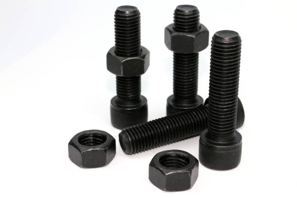 istock Black steel bolts and nuts mechanical part 948520640