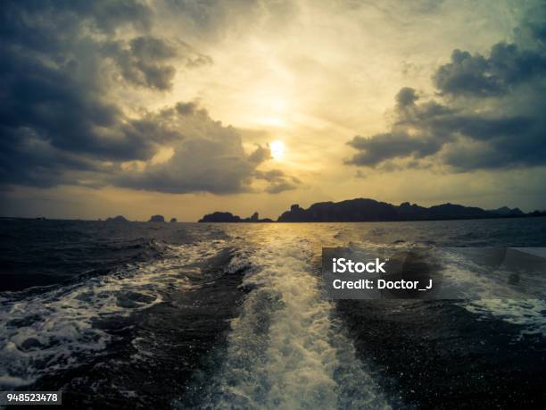 Sunset From A Long Tail Boat Railay Beach On The Background Krabi Thailand Stock Photo - Download Image Now