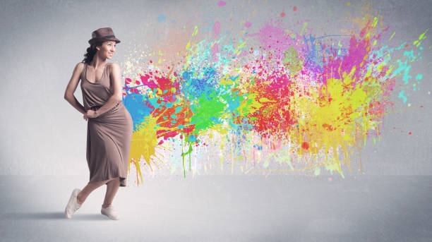 istock Young colorful street dancer with paint splash 948523738