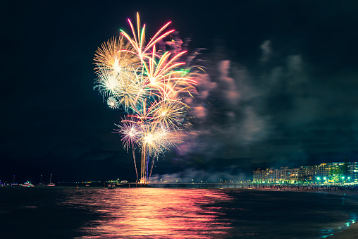 Fireworks display on New Year eve at Glenelg beach from jetty, South Australia