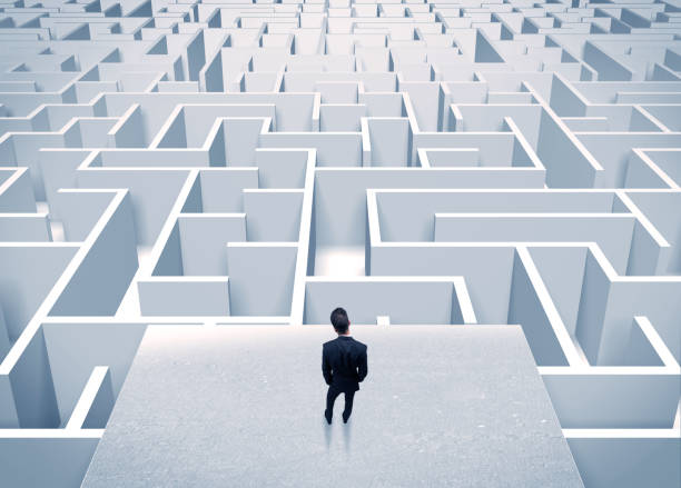 istock Businessman staring at infinite maze 948531918