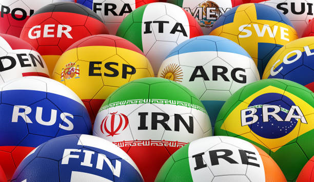 istock soccer balls colored in different national flag colors - 3D rendering 948532052