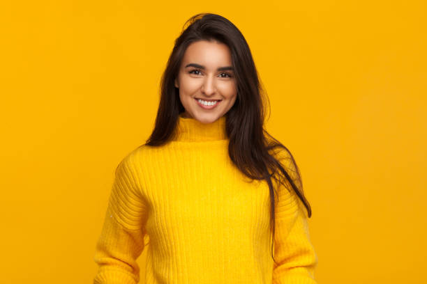 istock Charming successful girl in yellow 948532424