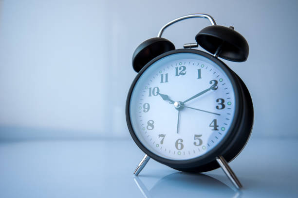 istock Retro style analog black alarm clock 948535968