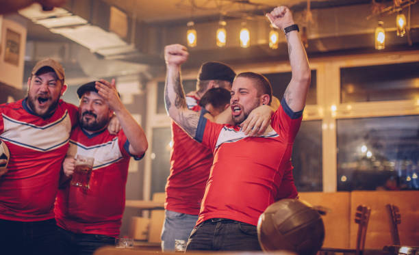 istock Football fans at pub 948539782