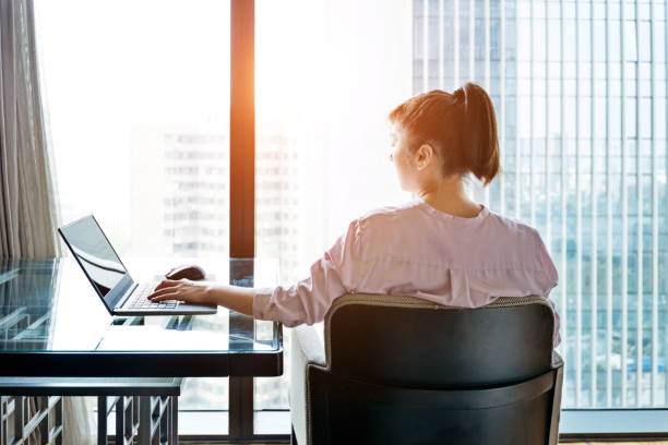 istock Woman working on a laptop 948544154