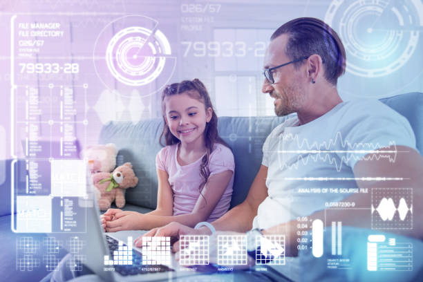 istock Progressive father watching cartoons with his child 948544700