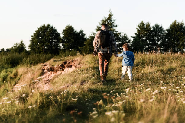 istock Father and son are traveling together 948555850
