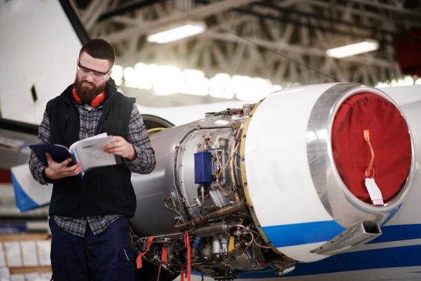 istock Aircraft mechanic in the hangar 948556420
