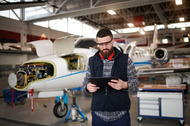 istock Aircraft mechanic in the hangar 948556756