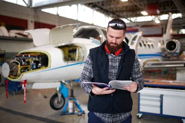 istock Aircraft mechanic in the hangar 948556806
