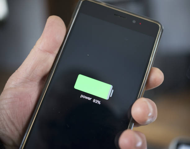 istock Close-up view of smartphone charging Low battery level 948567872