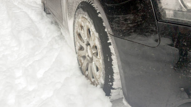 istock Winter tires on snowy road 948571220