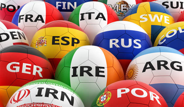 istock soccer balls colored in different national flag colors - 3D rendering 948571934