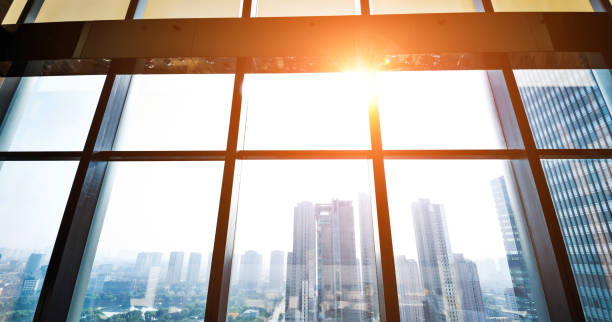 istock Modern building and cityscape outside the window 948571982
