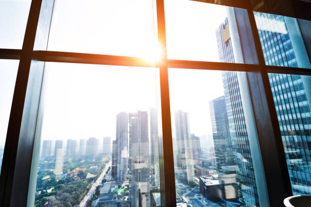 istock Modern building and cityscape outside the window 948571984