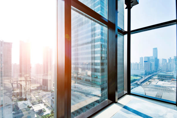 istock Modern building and cityscape outside the window 948572262