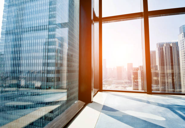 istock Modern building and cityscape outside the window 948572362